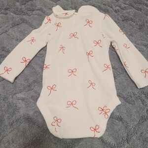 White Baby Onesie with Red Bow Accents